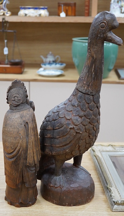 A Chinese bamboo figure of a lady and a large carved wooden bird, 55cm high. Condition - fair